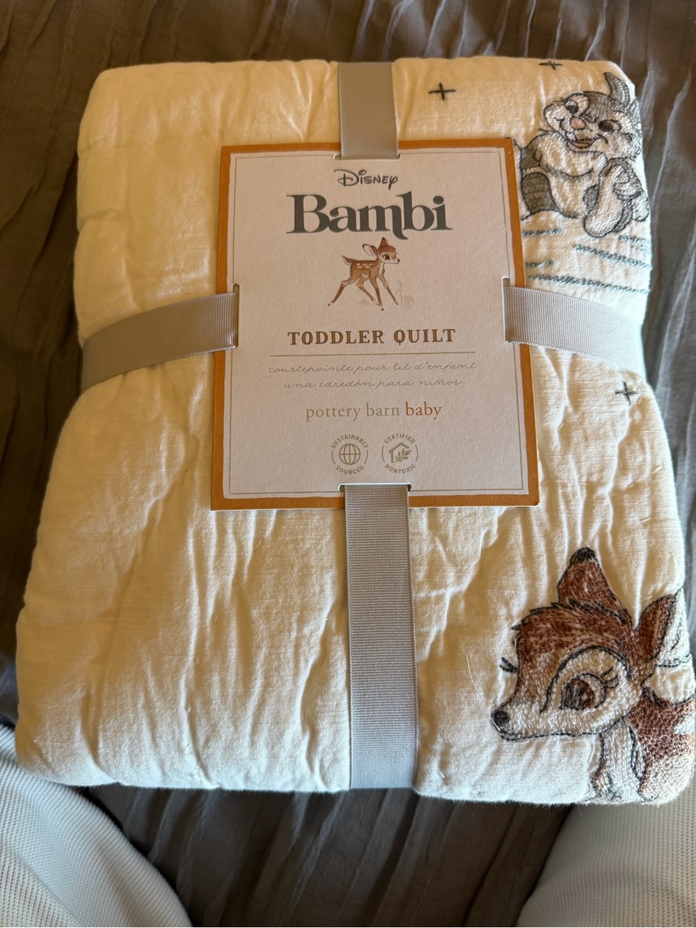 Pottery Barn Kids Bambi Toddler Quilt in Cream and Brown